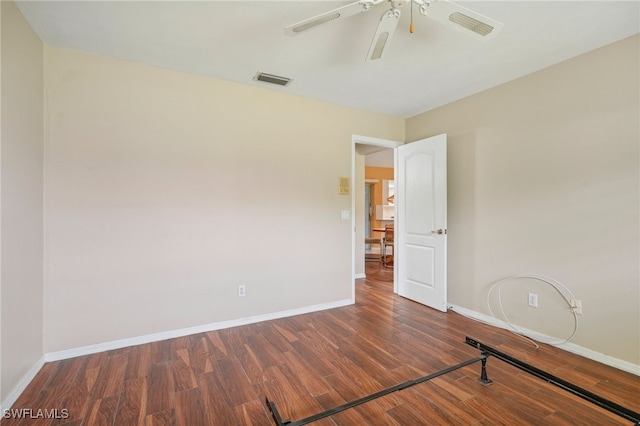 unfurnished room with ceiling fan and hardwood / wood-style flooring