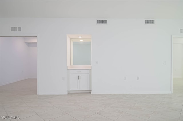 view of tiled spare room