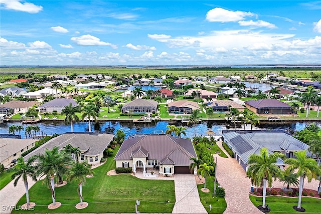 drone / aerial view with a water view