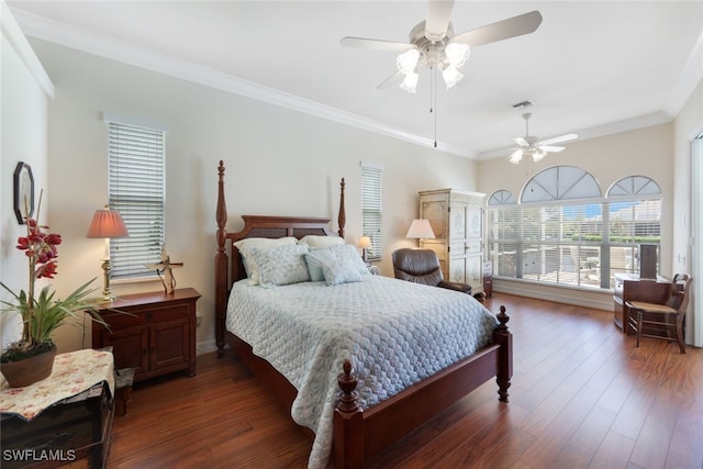 bedroom featuring visible vents, ornamental molding, ceiling fan, and wood finished floors