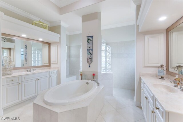 bathroom with tile patterned floors, shower with separate bathtub, ornamental molding, and vanity