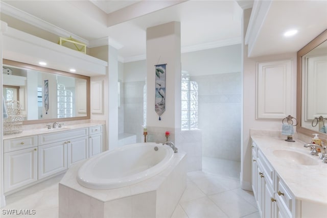 full bath with a walk in shower, a garden tub, ornamental molding, two vanities, and a sink