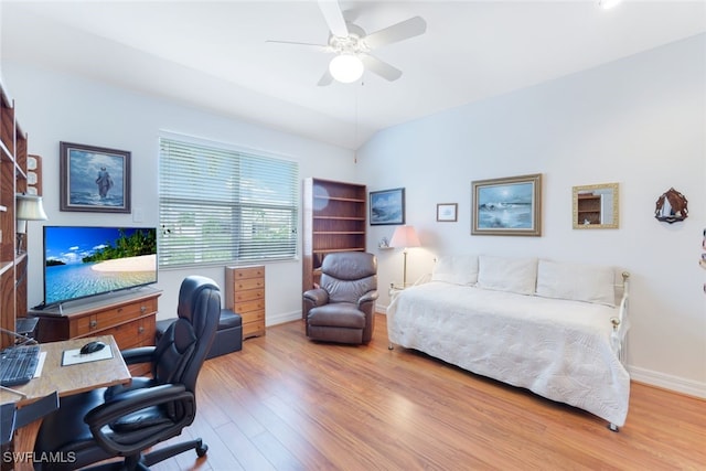 bedroom featuring vaulted ceiling, ceiling fan, baseboards, and wood finished floors