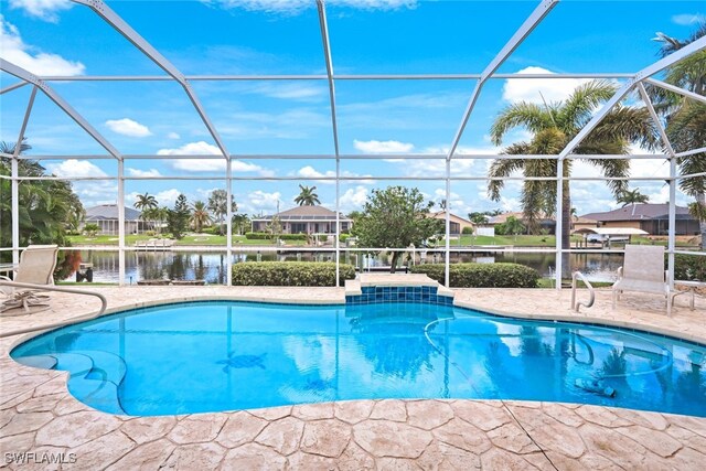 view of pool featuring a lanai and a water view