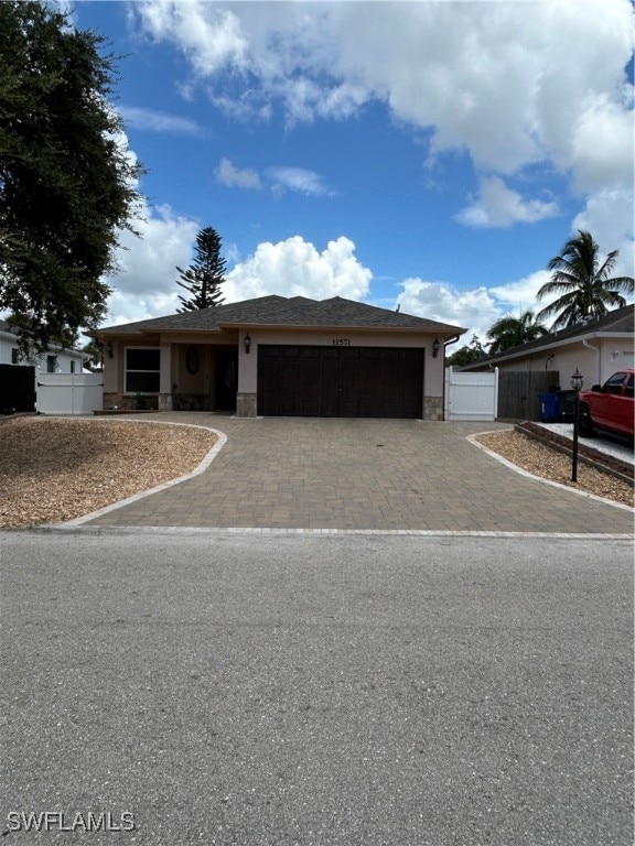 view of front of home with a garage