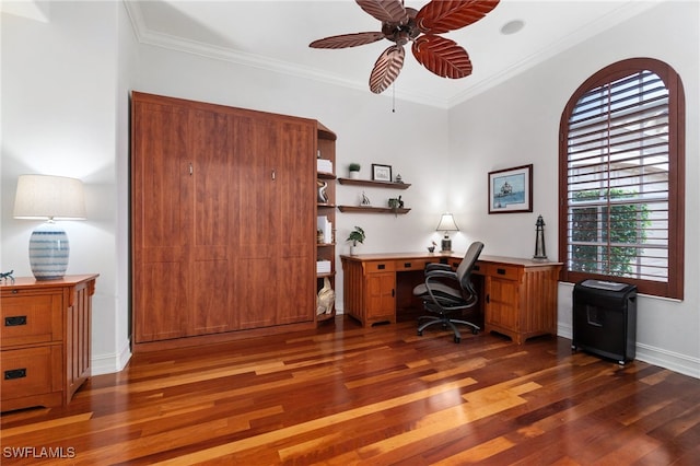 office area with crown molding, ceiling fan, and dark wood-type flooring