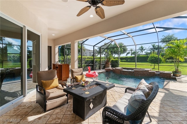 view of patio with a lanai, pool water feature, ceiling fan, and a swimming pool with hot tub