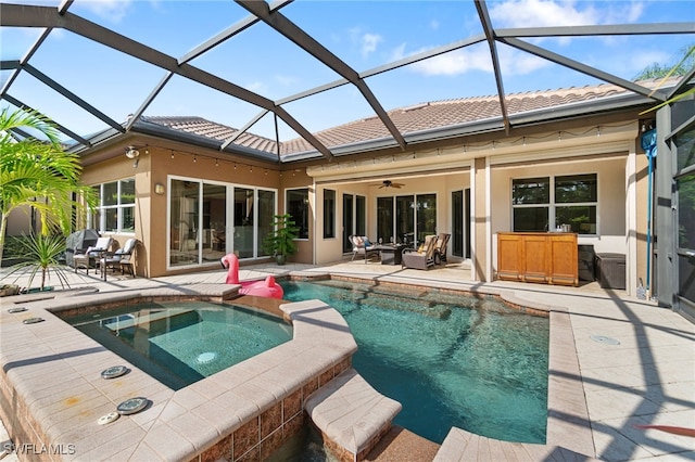 rear view of house featuring ceiling fan, a swimming pool with hot tub, glass enclosure, and a patio