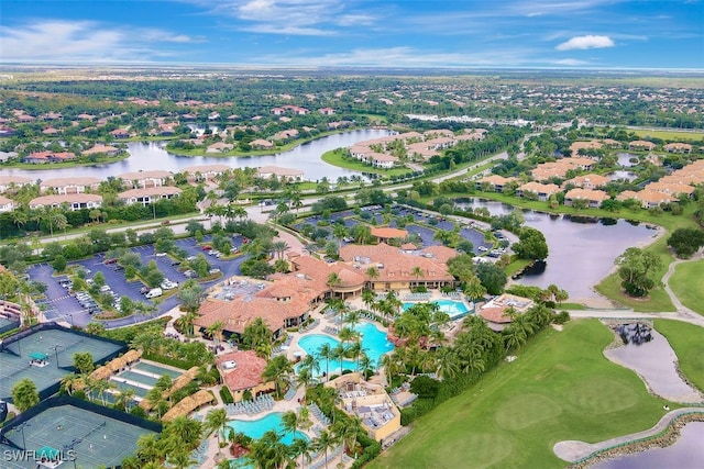 bird's eye view with a water view