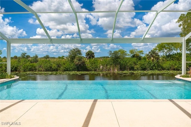 view of pool featuring a lanai, a patio, and a water view