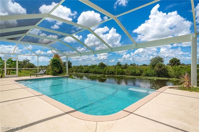 view of pool with a lanai, a patio, and a water view