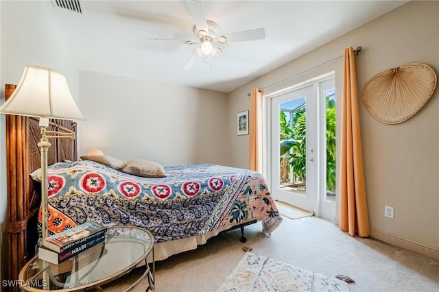 carpeted bedroom featuring access to exterior and ceiling fan