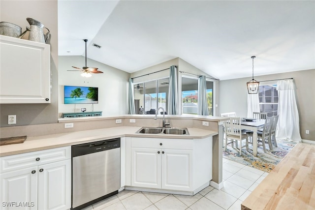 kitchen featuring white cabinetry, pendant lighting, ceiling fan, stainless steel dishwasher, and sink