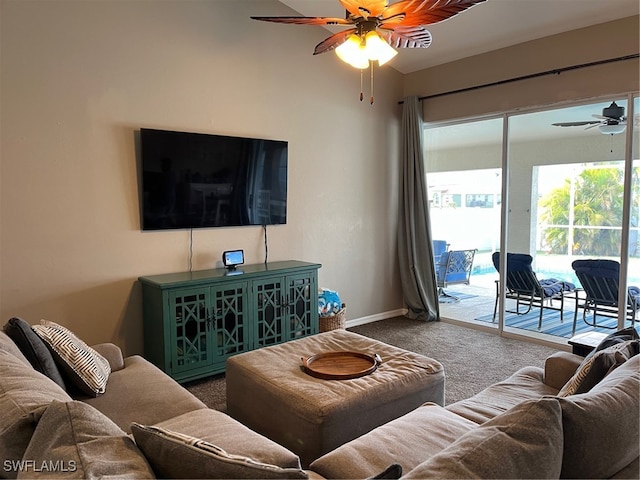 carpeted living room with ceiling fan