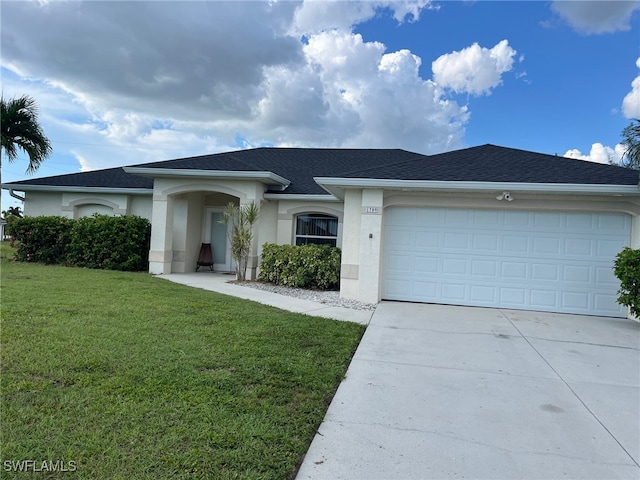 single story home with a garage and a front yard