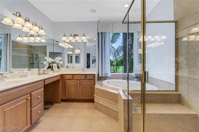 bathroom with a garden tub, a sink, a shower stall, tile patterned floors, and double vanity