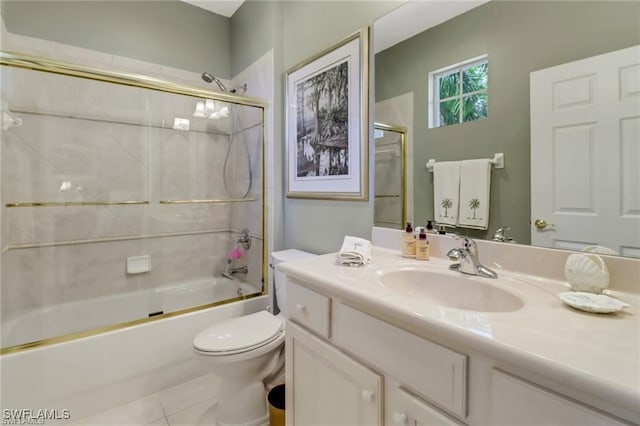 full bathroom featuring toilet, shower / bathing tub combination, and vanity