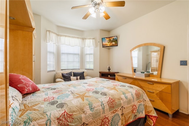 bedroom featuring ceiling fan and hardwood / wood-style floors