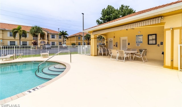 view of pool with a patio area