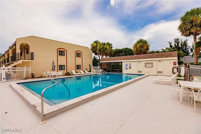 view of swimming pool featuring a patio