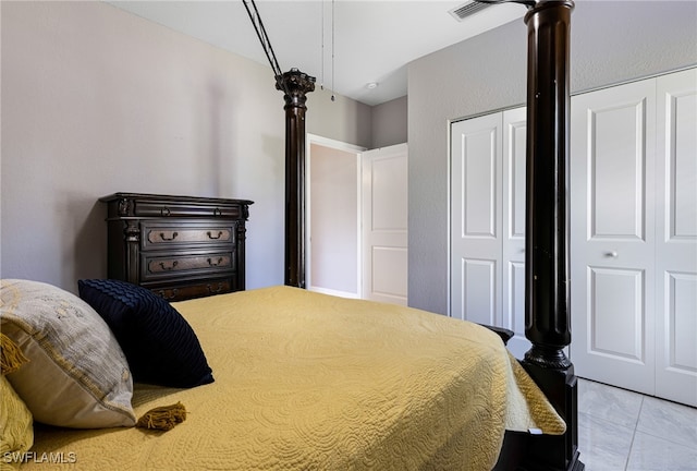 bedroom featuring light tile patterned floors