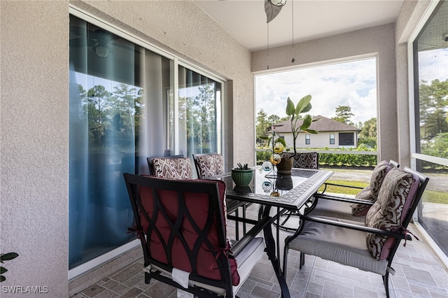 sunroom / solarium featuring a wealth of natural light