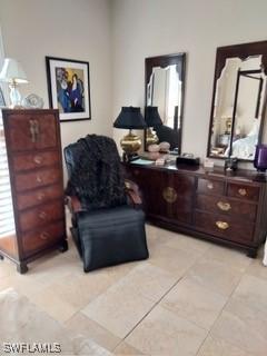 living area featuring light tile patterned floors