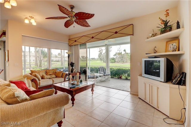 tiled living room featuring ceiling fan