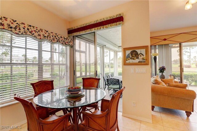 tiled dining space with plenty of natural light