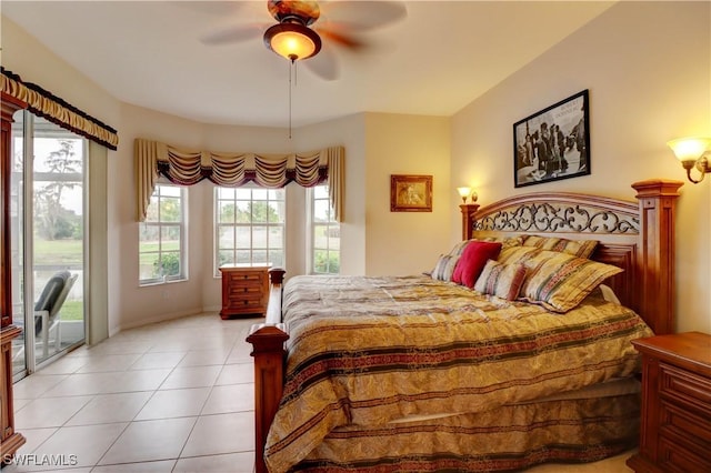 bedroom featuring access to exterior, a ceiling fan, and light tile patterned flooring