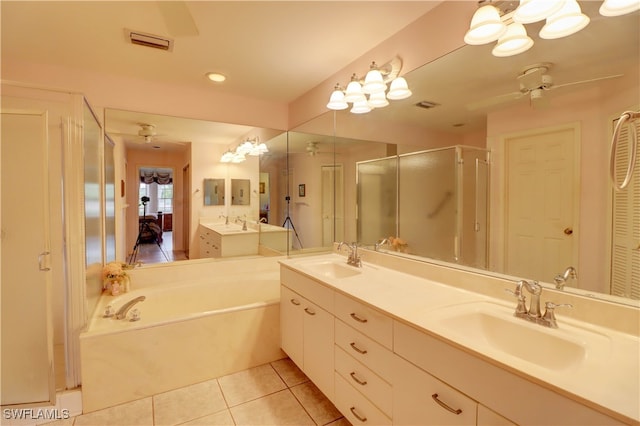 bathroom with shower with separate bathtub, vanity, ceiling fan, and tile patterned floors