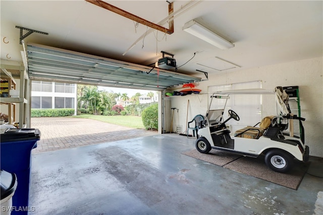 garage featuring a garage door opener