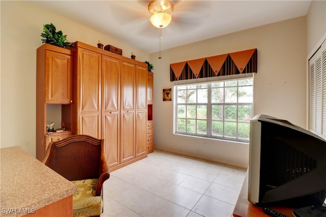 bedroom with light tile patterned floors