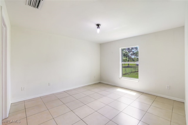 view of tiled empty room