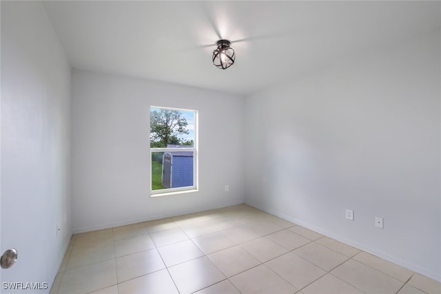 view of tiled spare room