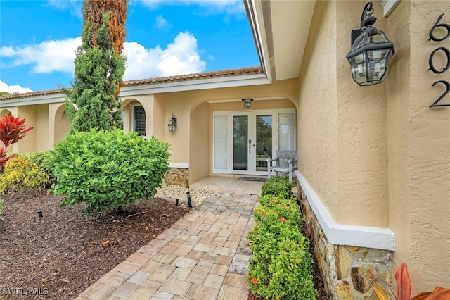 doorway to property featuring french doors