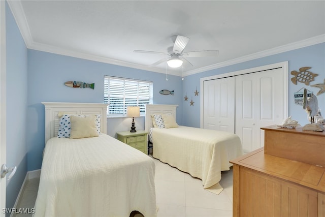 bedroom with crown molding, ceiling fan, a closet, and light tile patterned flooring