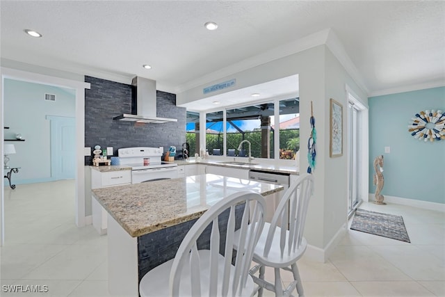 kitchen with crown molding, sink, electric range, wall chimney exhaust hood, and white cabinets