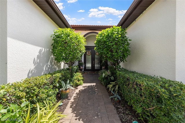 doorway to property featuring french doors