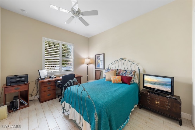 bedroom featuring ceiling fan and light hardwood / wood-style floors