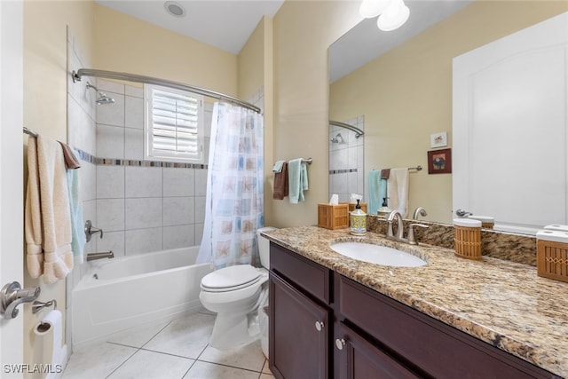 full bathroom featuring vanity, toilet, tile patterned floors, and shower / bath combo with shower curtain