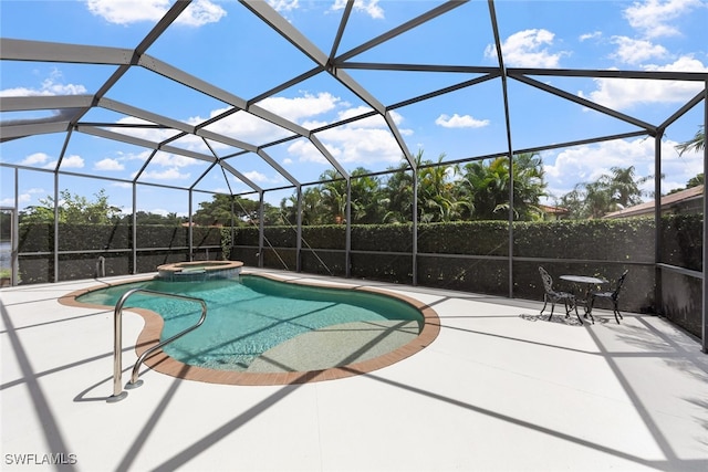 view of swimming pool featuring a lanai, an in ground hot tub, and a patio area