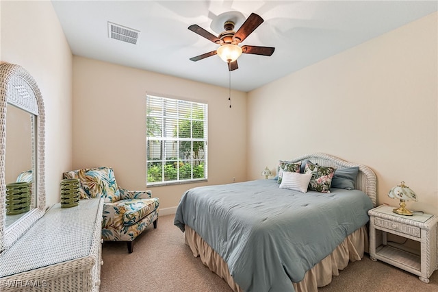 bedroom featuring ceiling fan and light colored carpet