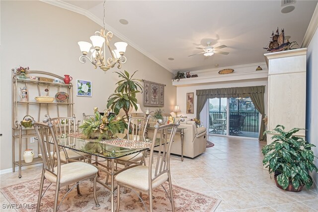 tiled dining space with ceiling fan with notable chandelier, crown molding, and vaulted ceiling