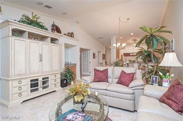 living room with lofted ceiling, light tile patterned floors, and ornamental molding