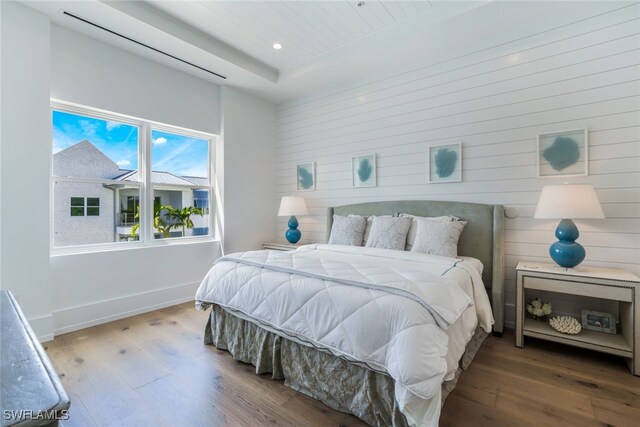 bedroom featuring hardwood / wood-style floors