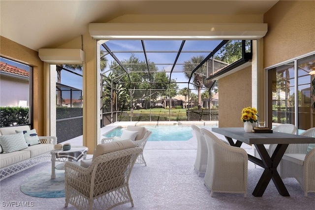 view of patio / terrace with a lanai and an outdoor living space