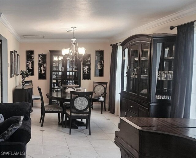 tiled dining area with ornamental molding and an inviting chandelier