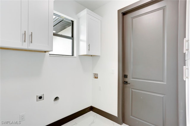 laundry room with marble finish floor, hookup for a washing machine, cabinet space, hookup for an electric dryer, and baseboards