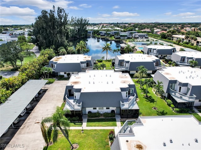 drone / aerial view featuring a water view